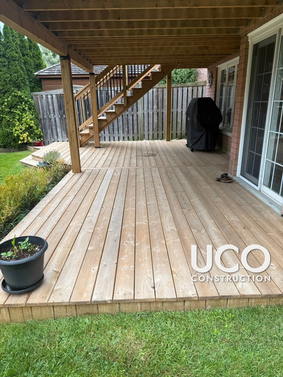 Deck Staining in Ajax: Two-Level Deck With Staircase, Railings and Lower Patio Deck Stained After Colour Sampling