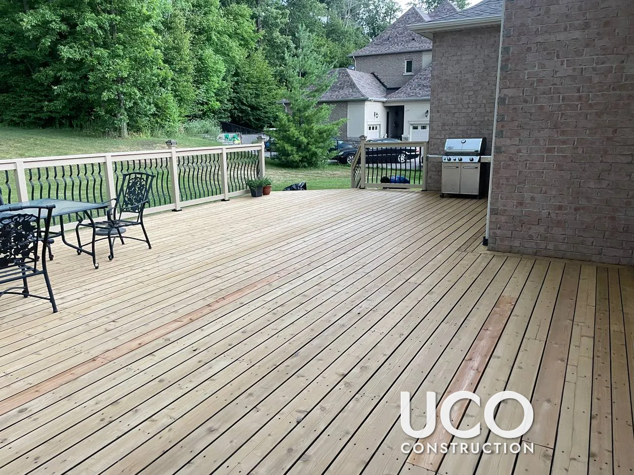 Deck Staining in Bradford: Large Raised Deck and Wide Stairs Sanded and Refinished in a Natural Stain