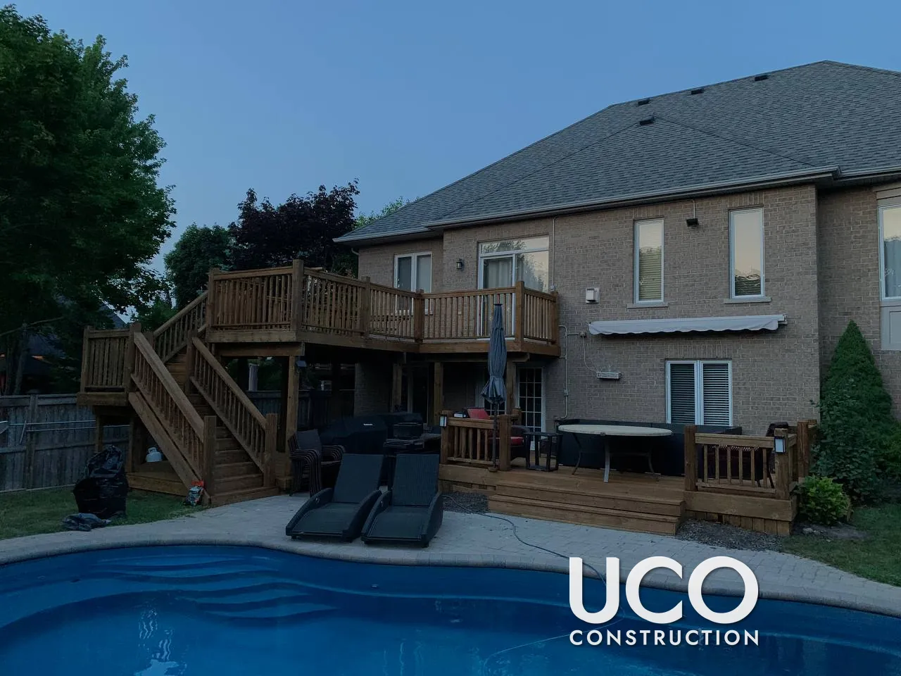 Deck Restoration in Uxbridge: Two-Level Pool Deck, Staircase and Railings Cleaned, Power Washed, Sanded and Stained