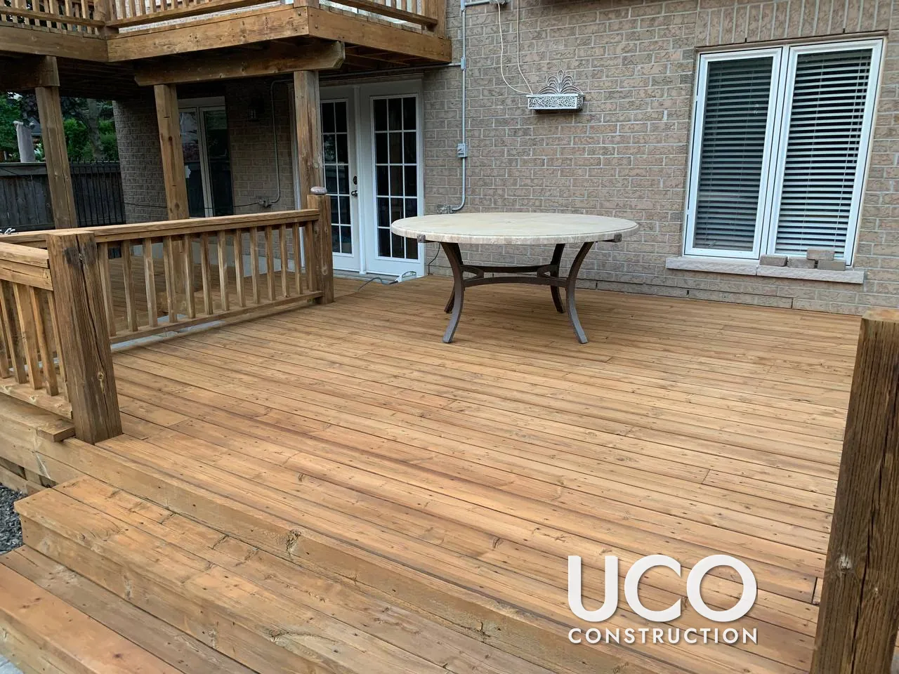 Deck Restoration in Uxbridge: Two-Level Pool Deck, Staircase and Railings Cleaned, Power Washed, Sanded and Stained