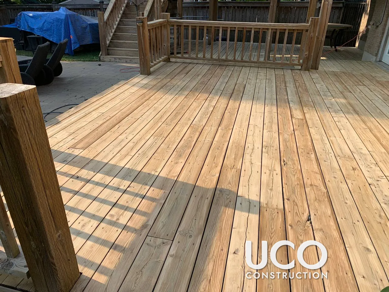 Deck Restoration in Uxbridge: Two-Level Pool Deck, Staircase and Railings Cleaned, Power Washed, Sanded and Stained