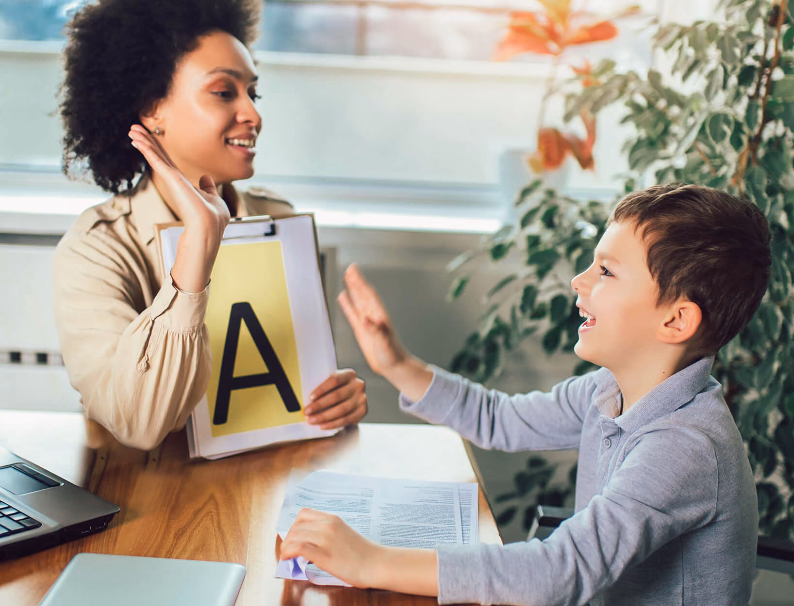 Teacher teaching child