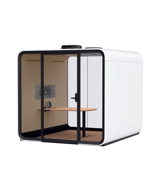 Modern soundproof office pod with glass sliding door, wooden desk, mounted monitor, and built-in technology for private workspace.