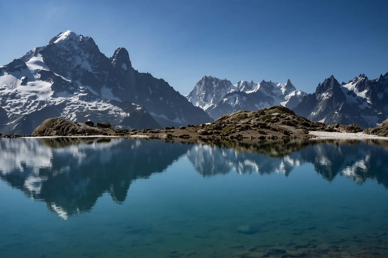An image of a lake in Aosta Valley with Mont Blanc in the background.