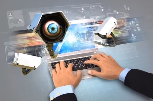 Graphic of osmoeone using a laptop while cameras record their every keystroke