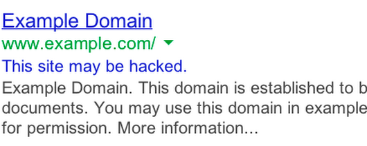 Google search result showing this site may be hacked alert.