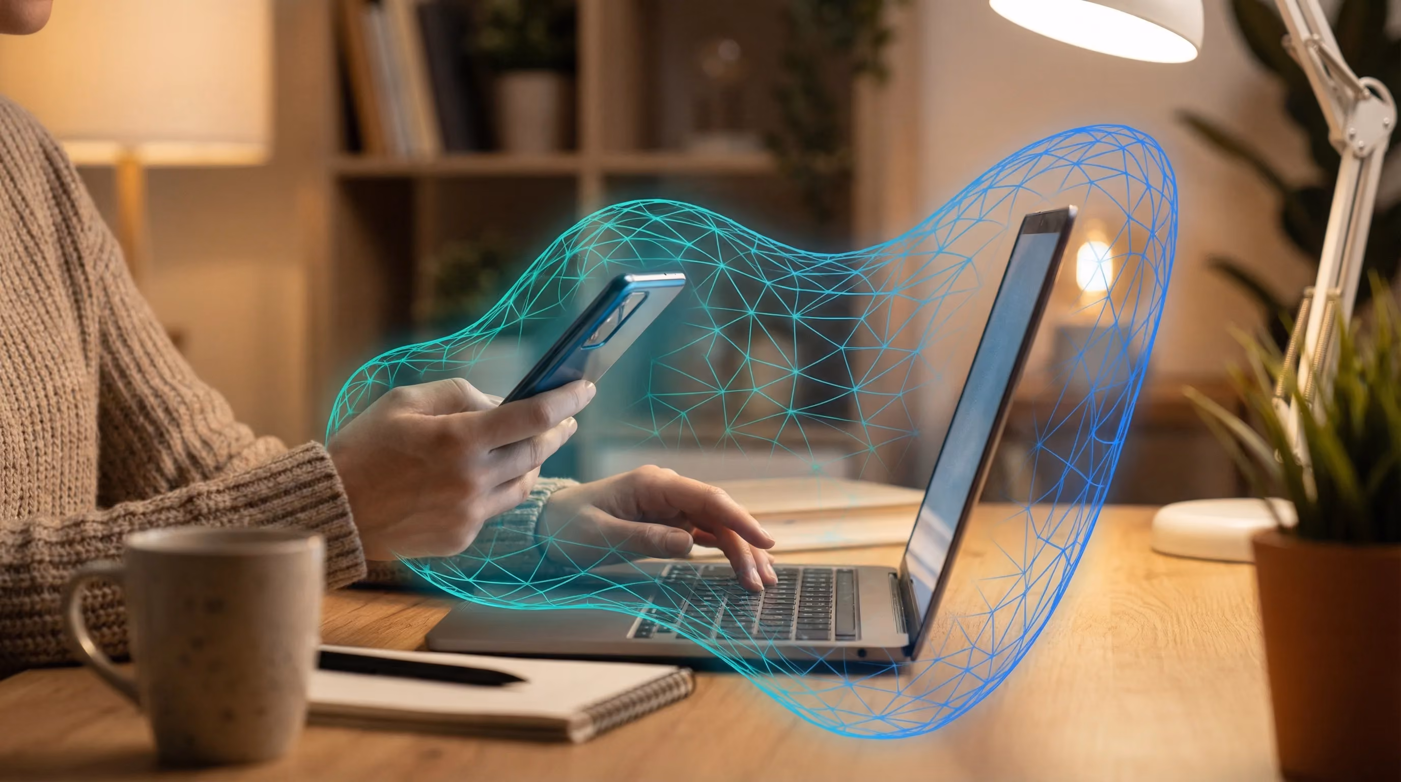Hands holding phone and laptop with AI neural network protective glow