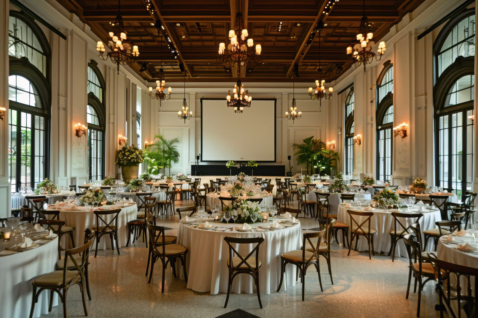 A large banquet hall with tables and chairs