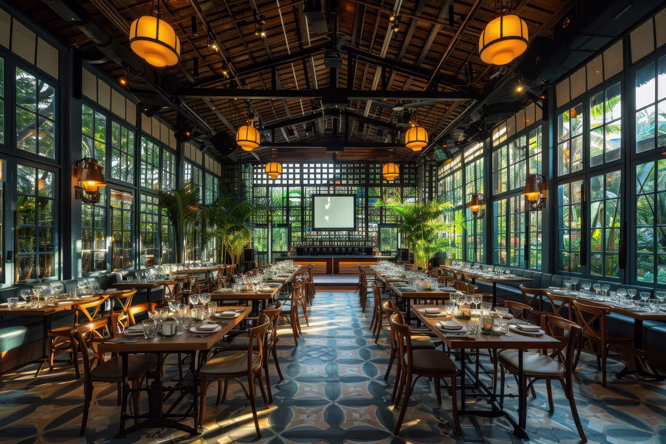 A large banquet hall with tables and chairs