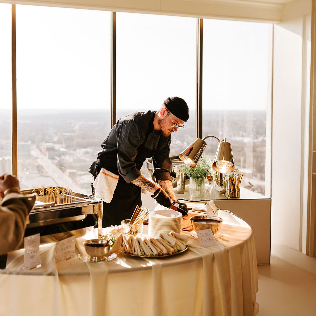 A man serving food.