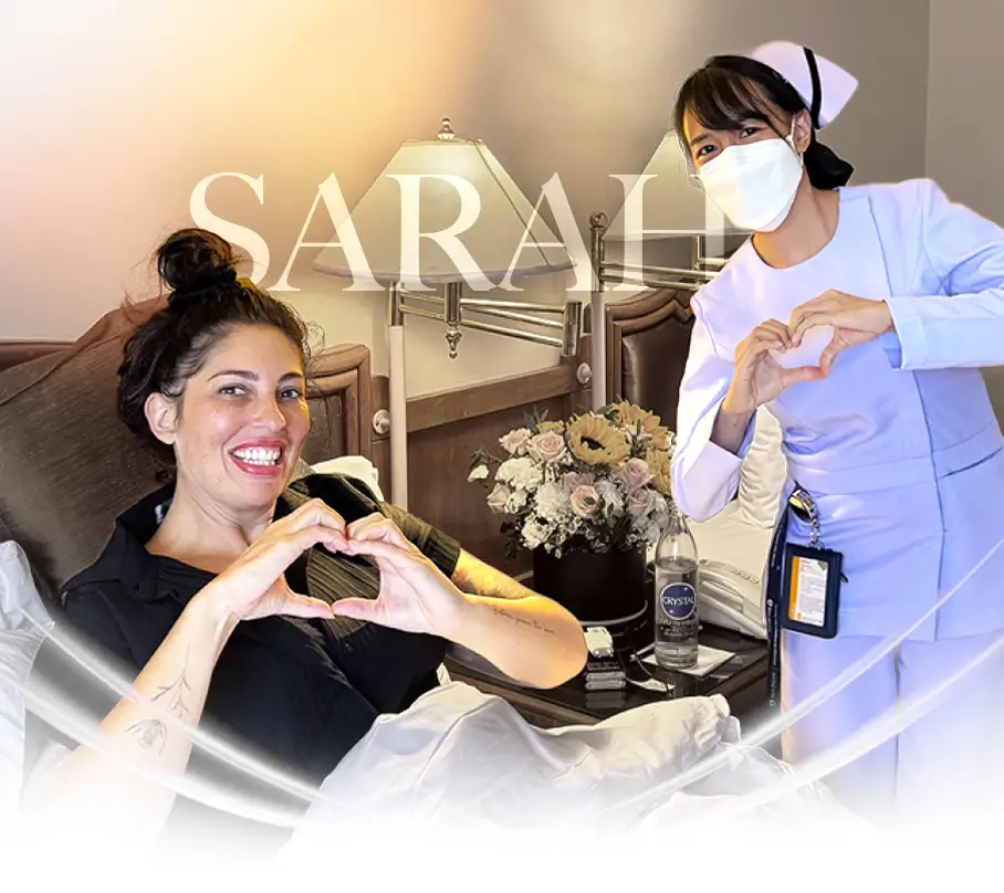 Nurse and patient do a heart with their hands