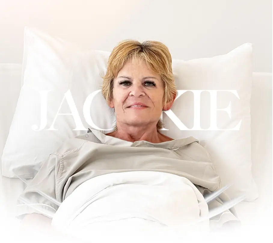 Happy patient in hospital bed