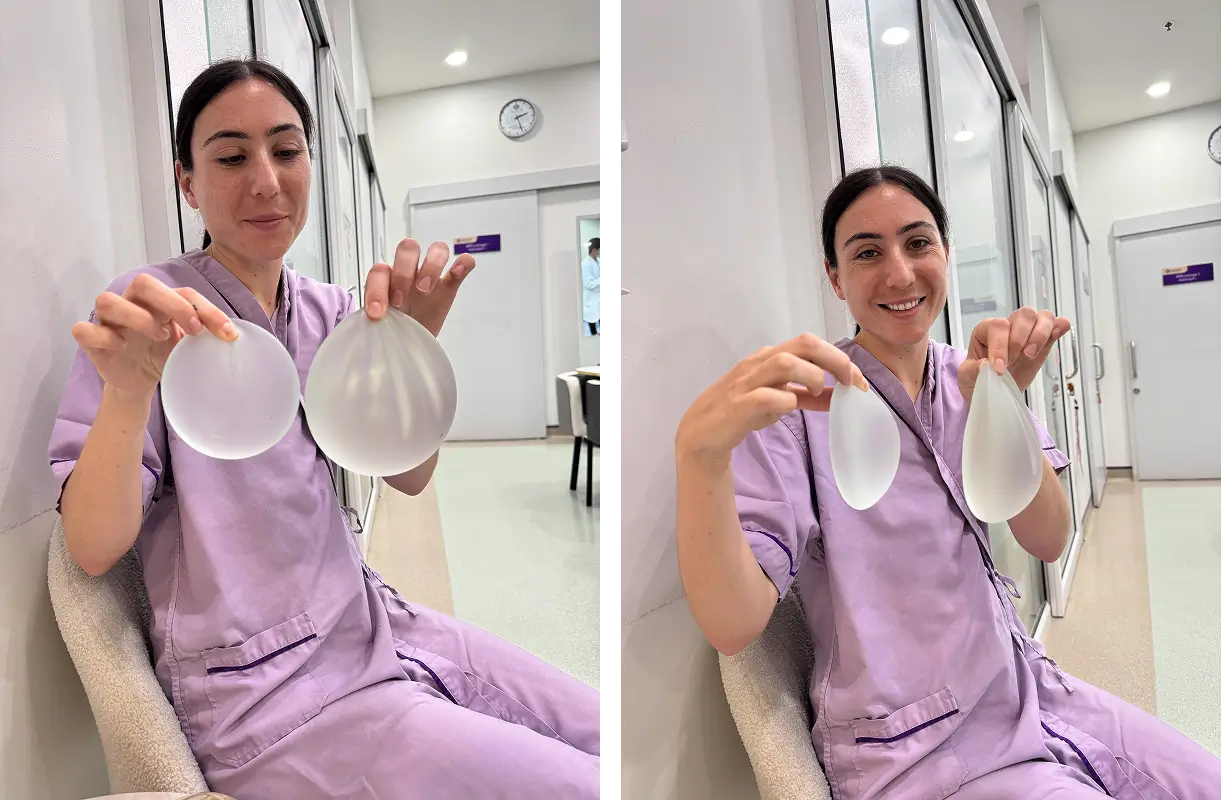 Payton smiling and holding breast implant samples while preparing for her breast augmentation consultation at Kasemrad Plastic Surgery Hospital in Bangkok.