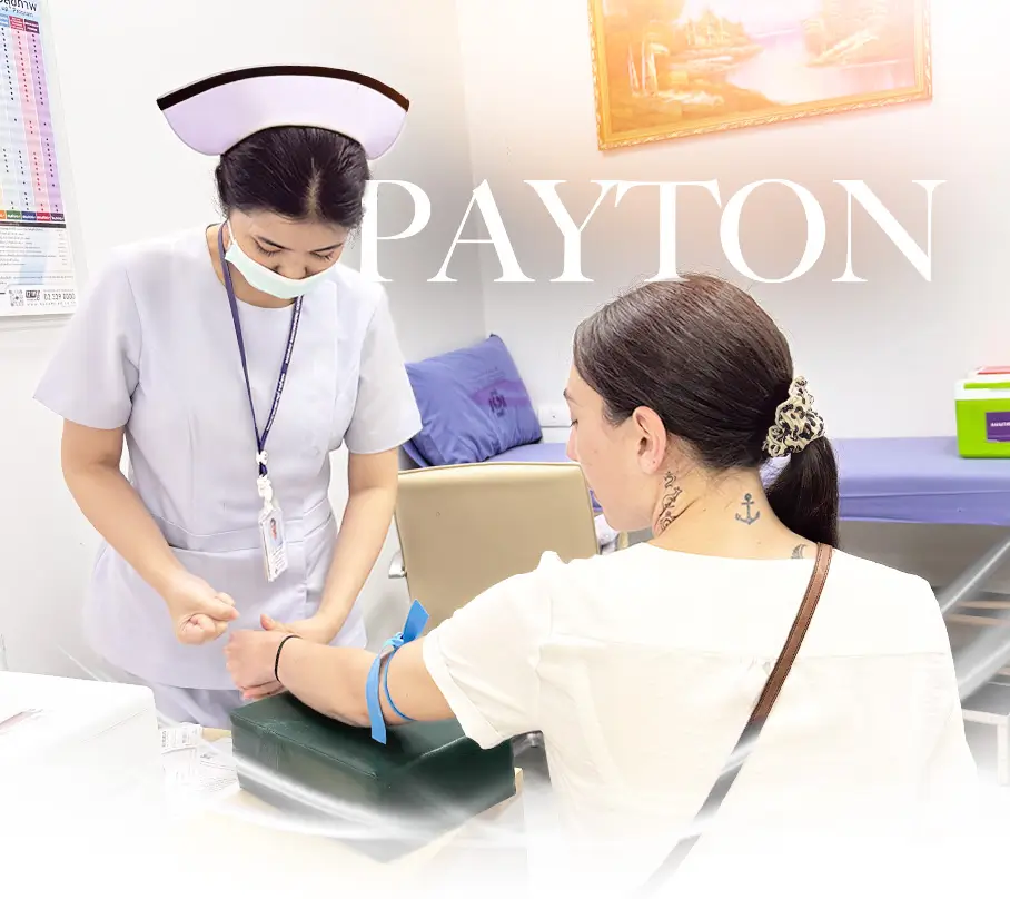 A nurse in a white uniform and cap prepares to draw blood from a woman seated in a clinic room. The woman has a ponytail with a leopard-print scrunchie and an anchor tattoo on her neck. The word “PAYTON” is displayed in large white letters over the image.