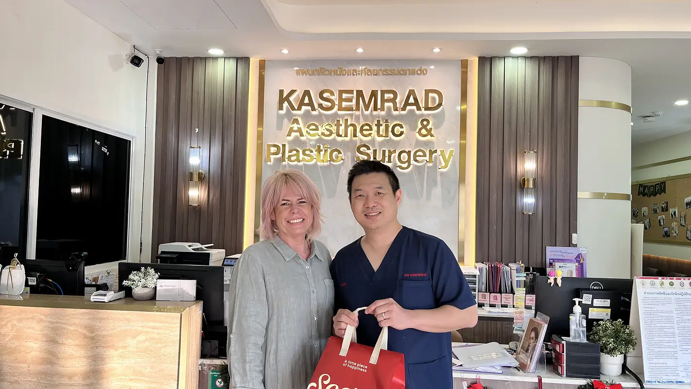 Susie presenting a thank you gift to Dr Note at the clinic