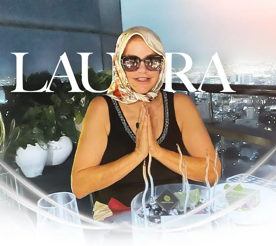 Woman sitting in a rooftop restaurant