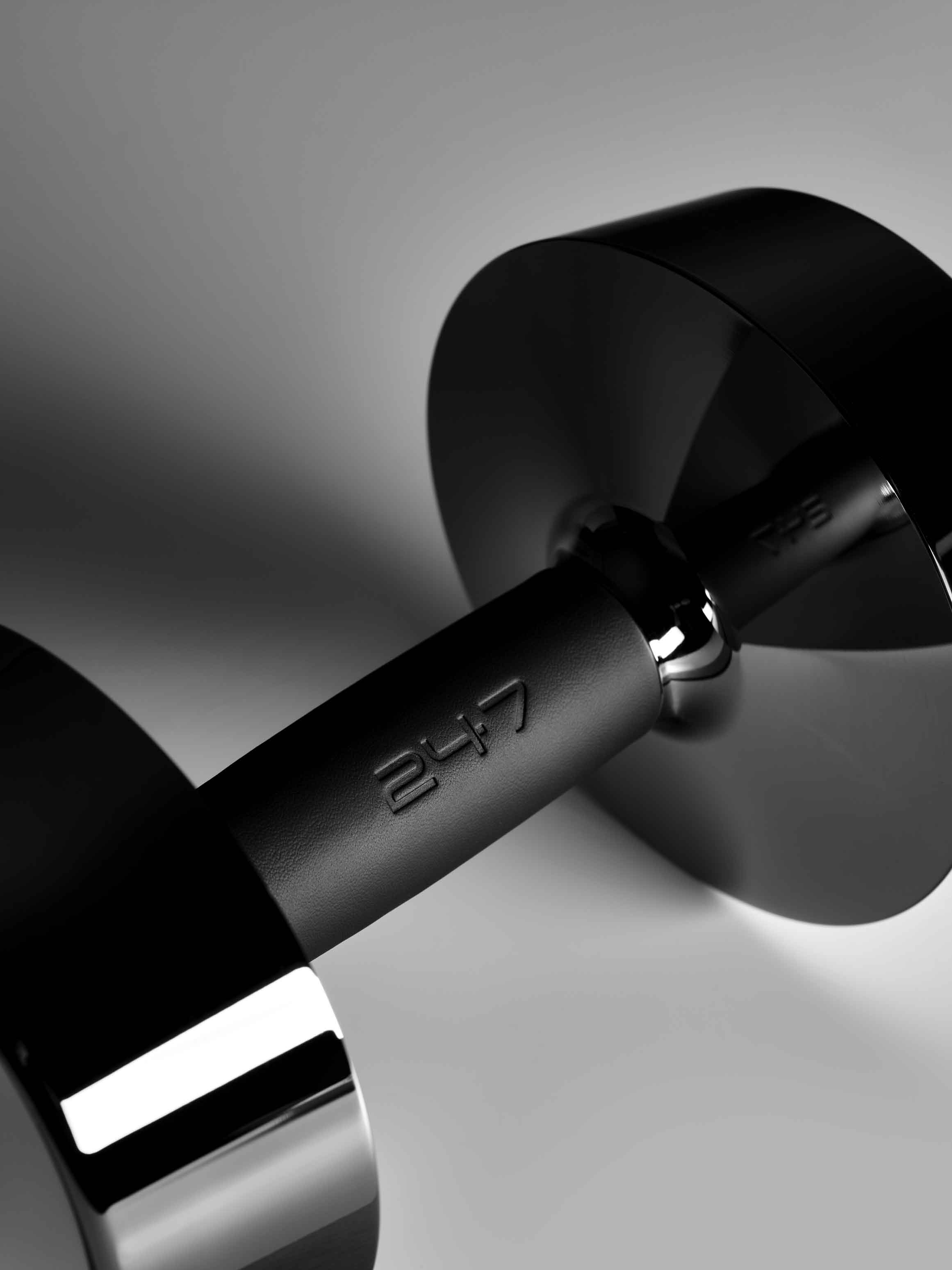 Close-up of the premium designer dumb bells with stainless steel covered with the finest genuine leather