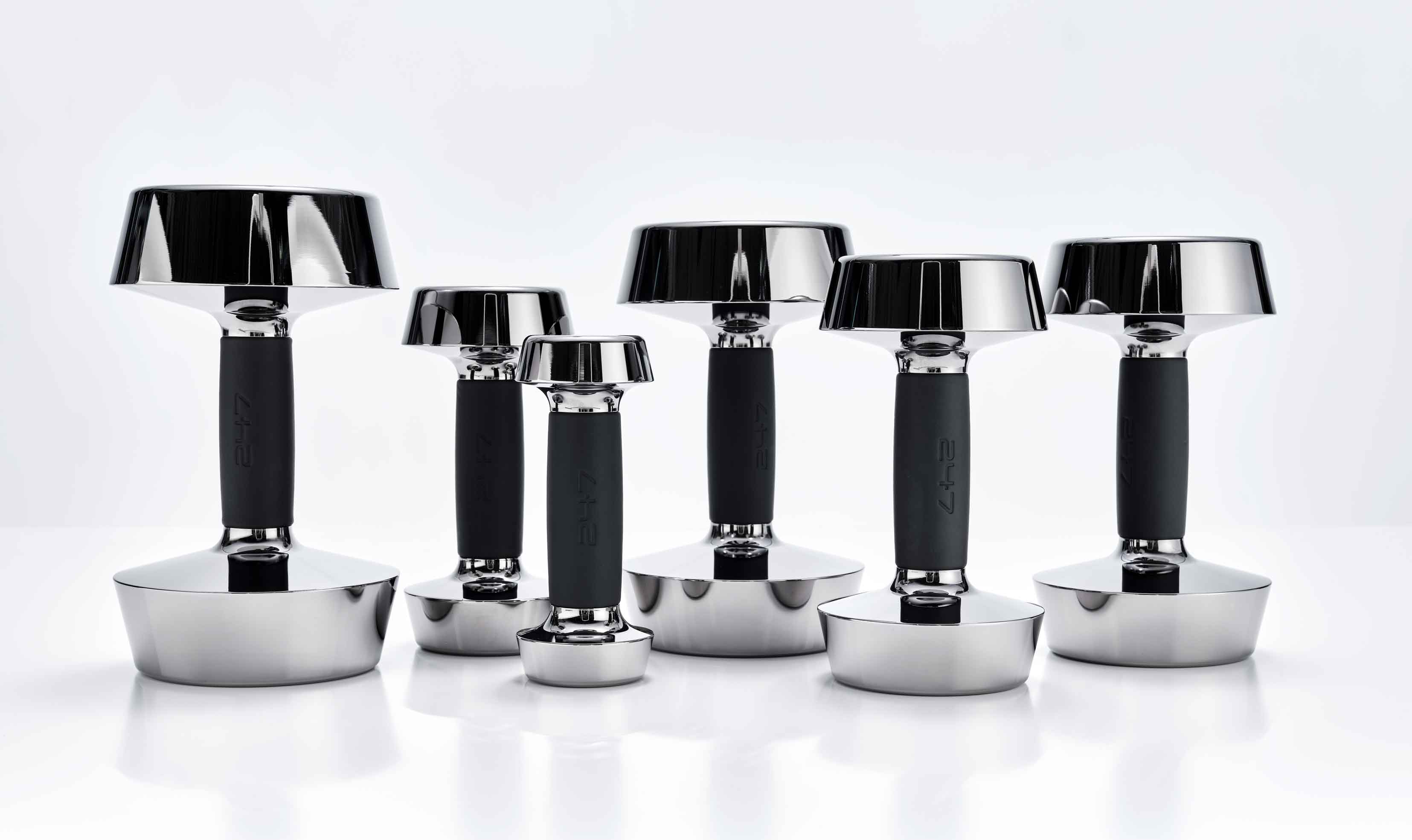 Family shot of the designer dumbbells by 247BILLIARDS made from high-quality stainless steel and finest genuine leather