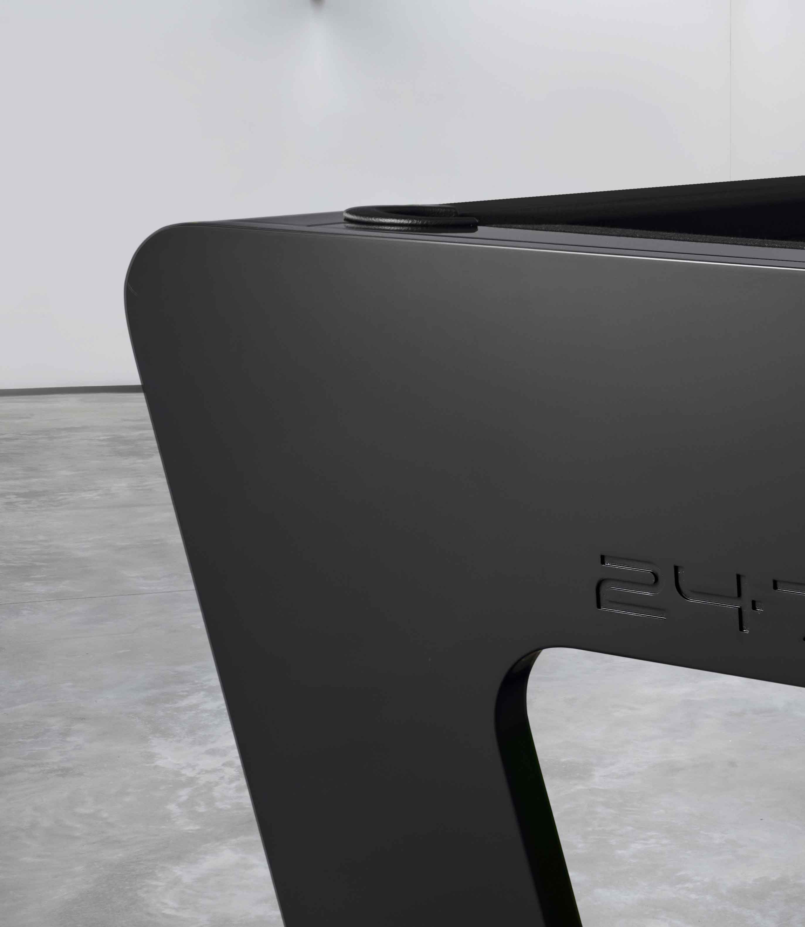 BW image of an elegant designer pool table in black designed by Studio F.A. Porsche