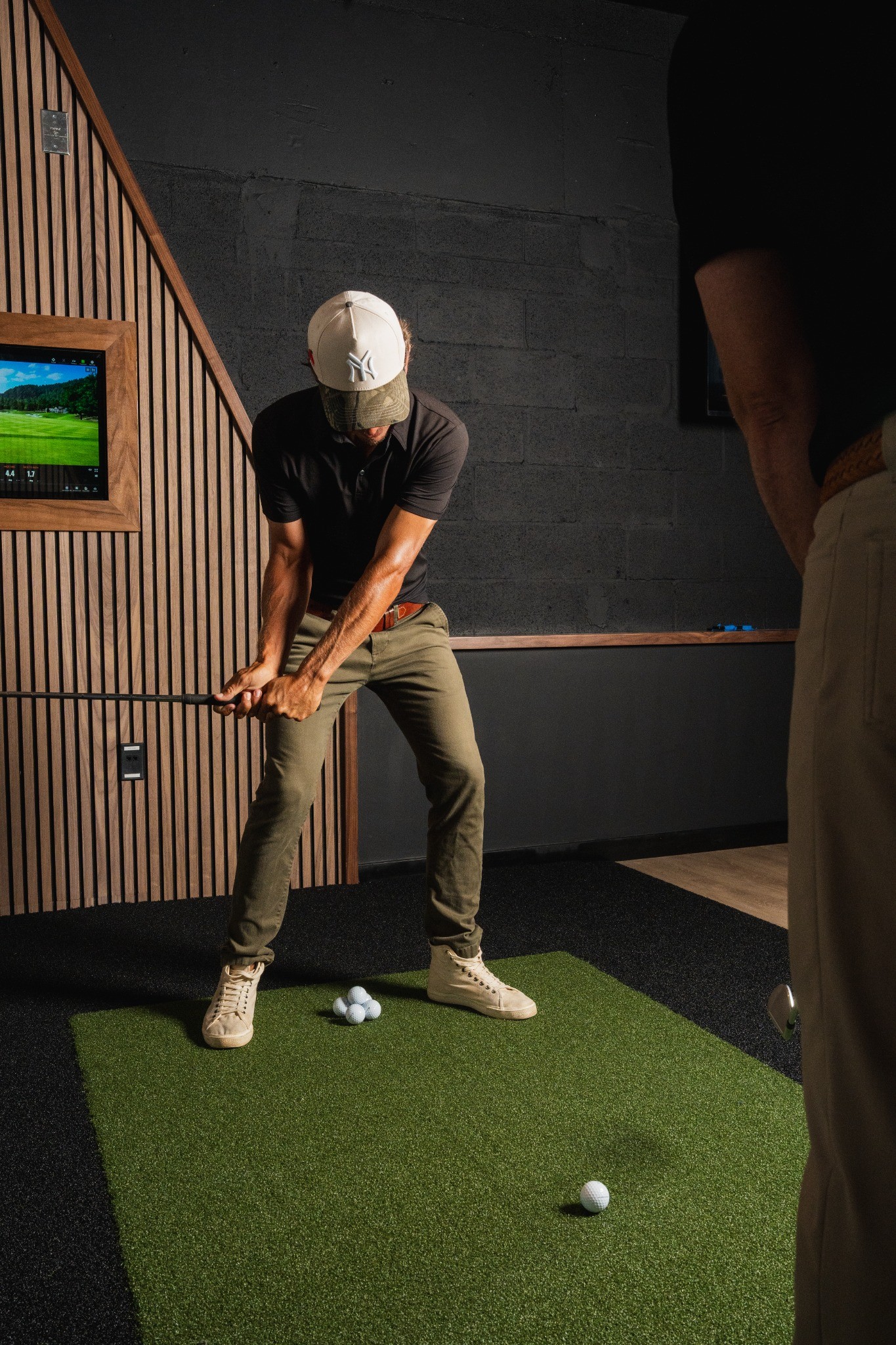 A man playing golf