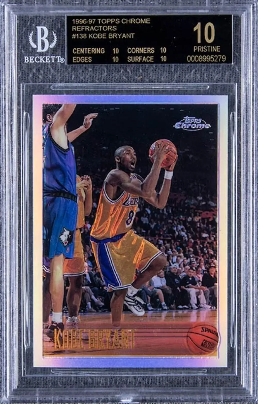 1996-97 Topps Chrome basketball card of Kobe Bryant in yellow Lakers uniform mid-air with basketball, graded pristine 10 by Beckett.