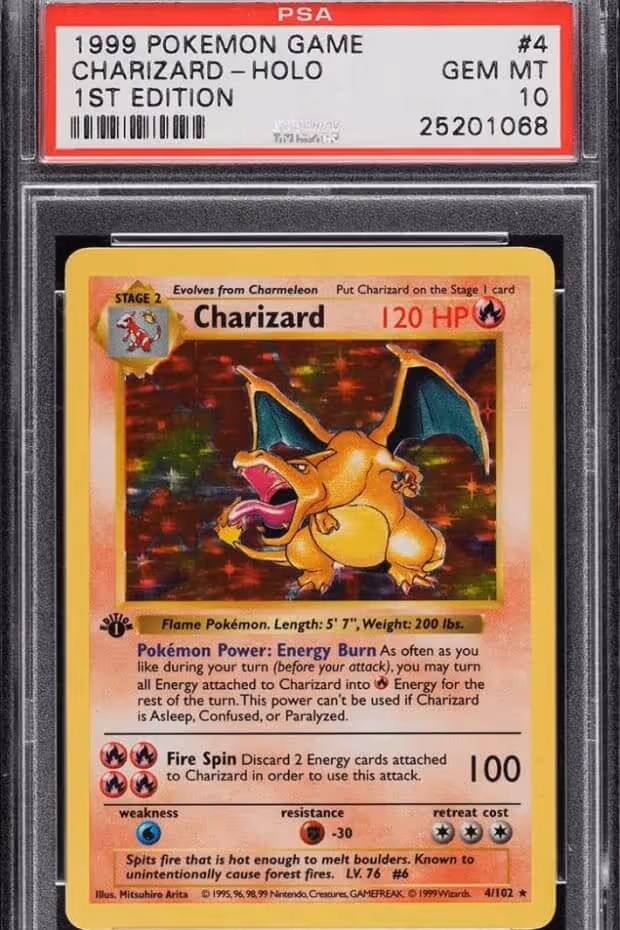1999 1st edition Charizard holographic Pokémon card graded GEM MT 10 by PSA.