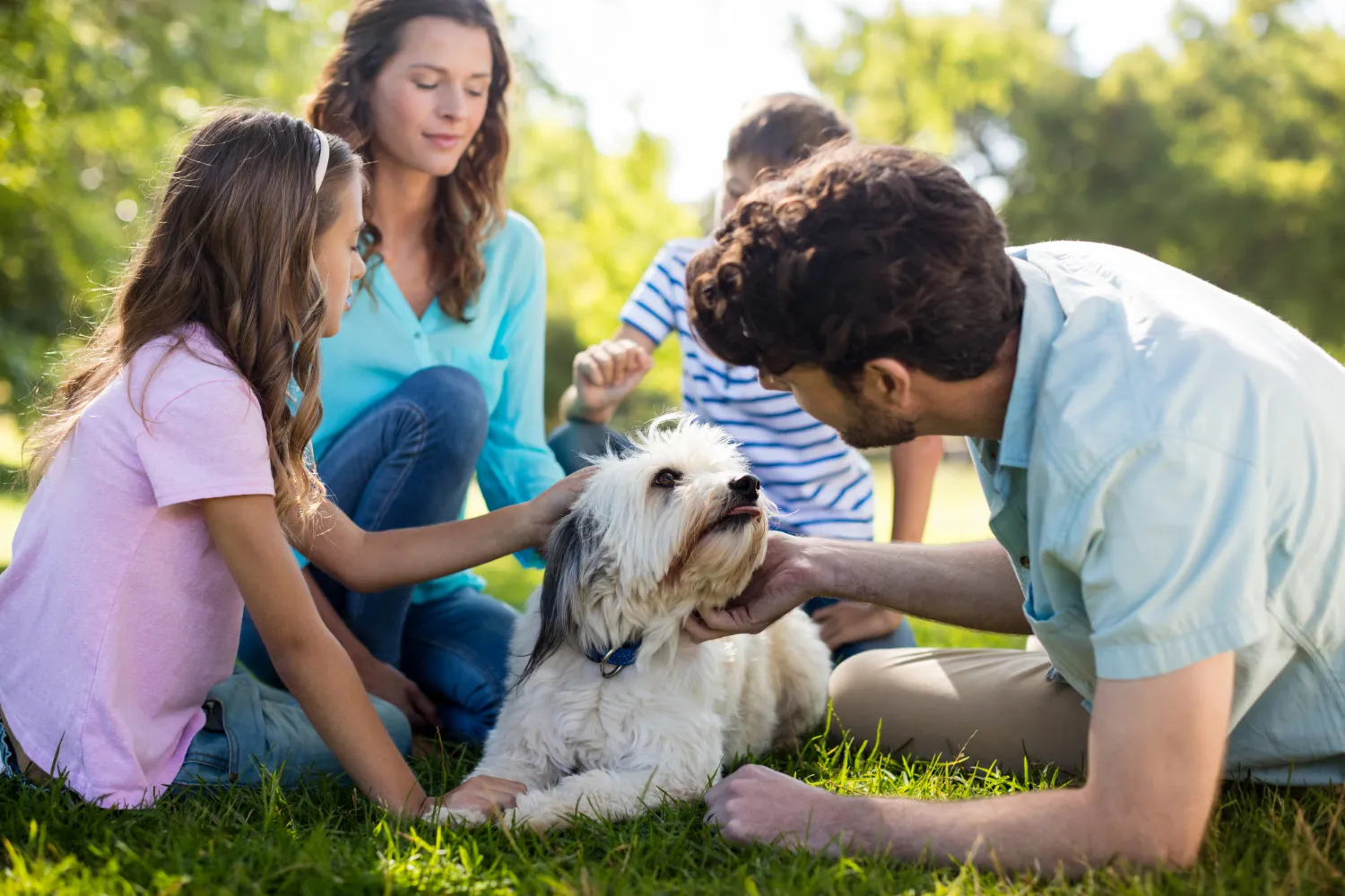 Happy family enjoying in park.