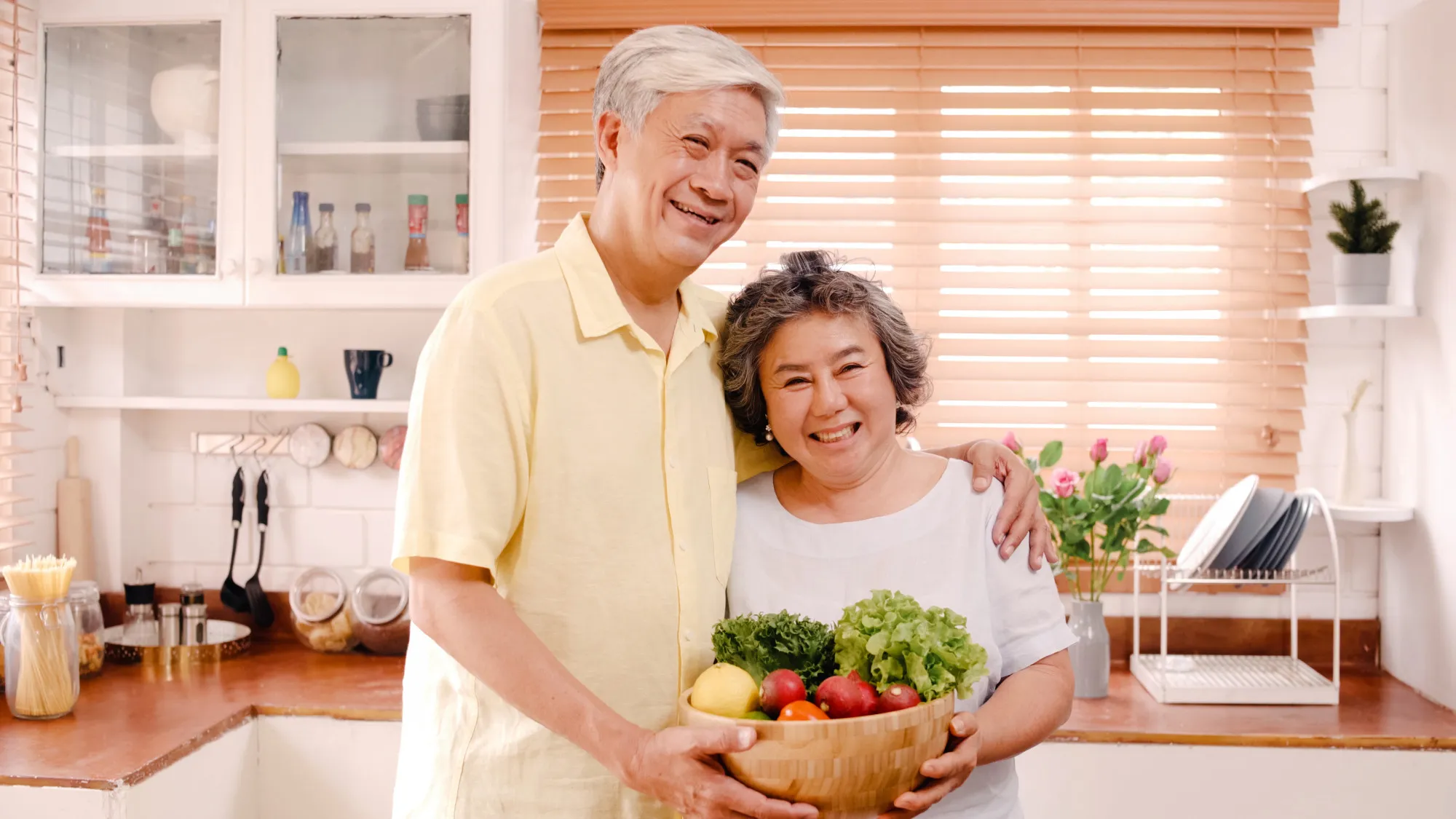 Asian elderly couple feeling happy smiling.