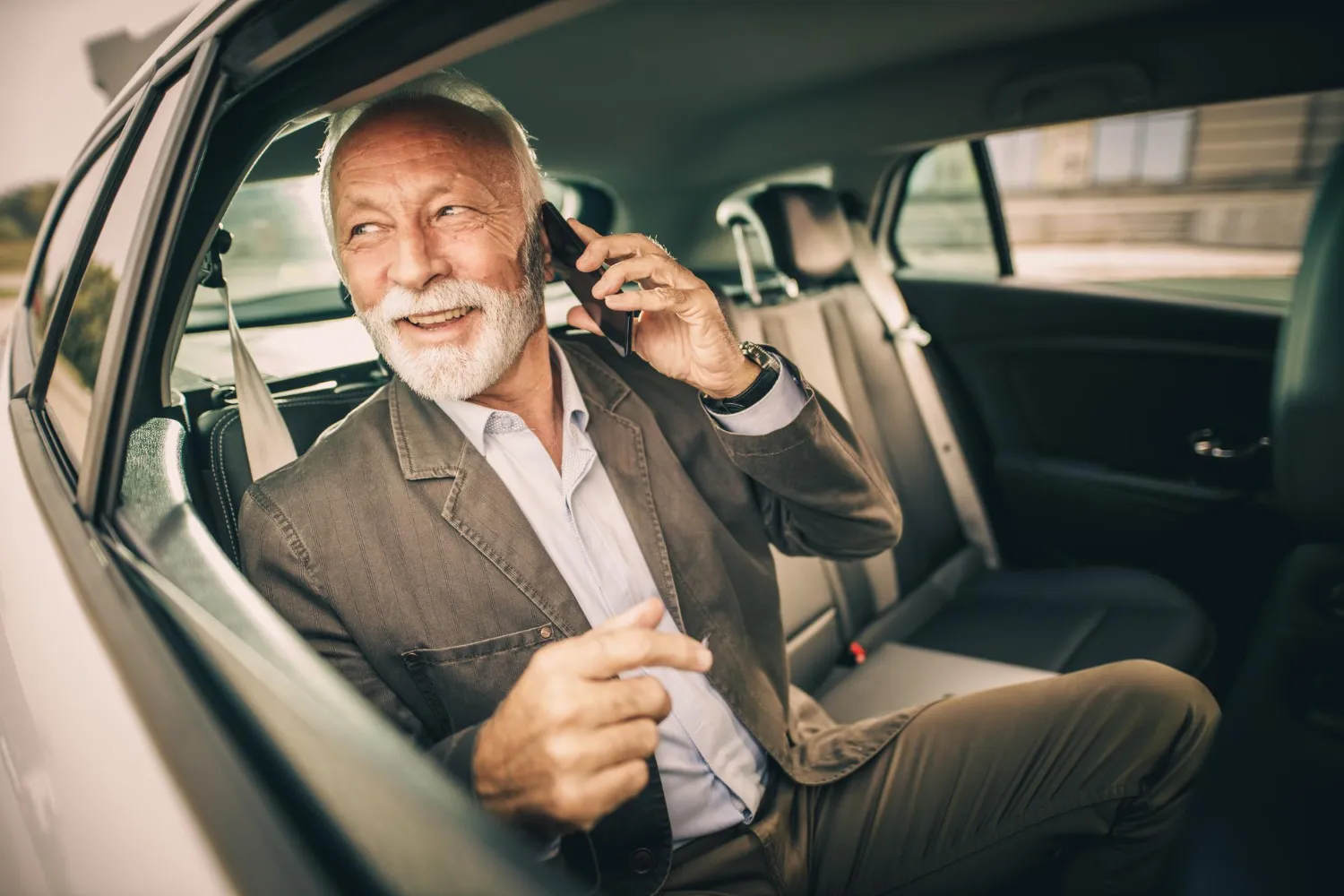 Person talking on a smartphone.