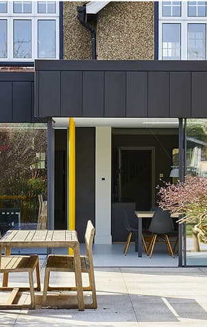 An photo of a rear extension with glass doors