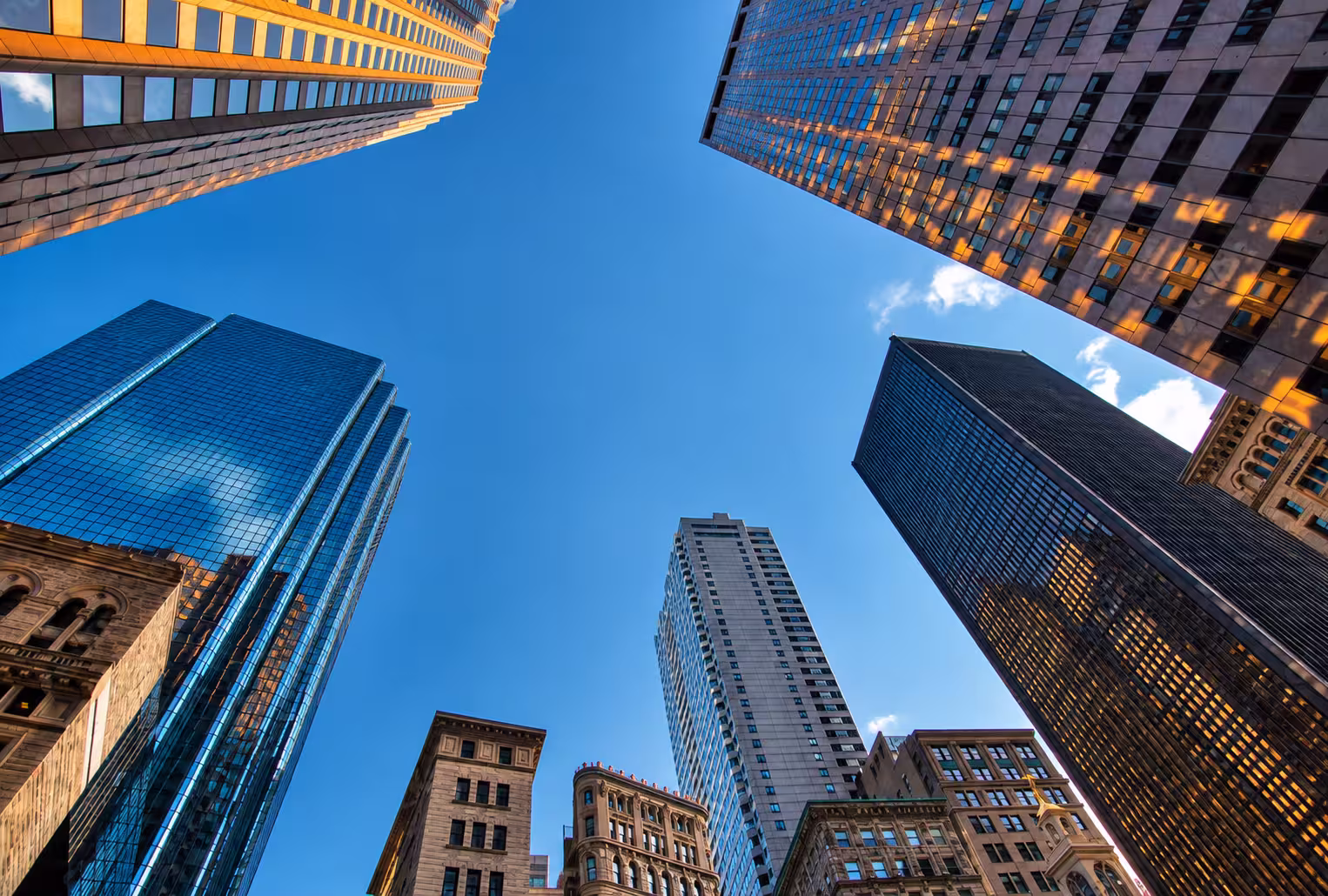 image of just tall office buildings stretching from the ground to the sky