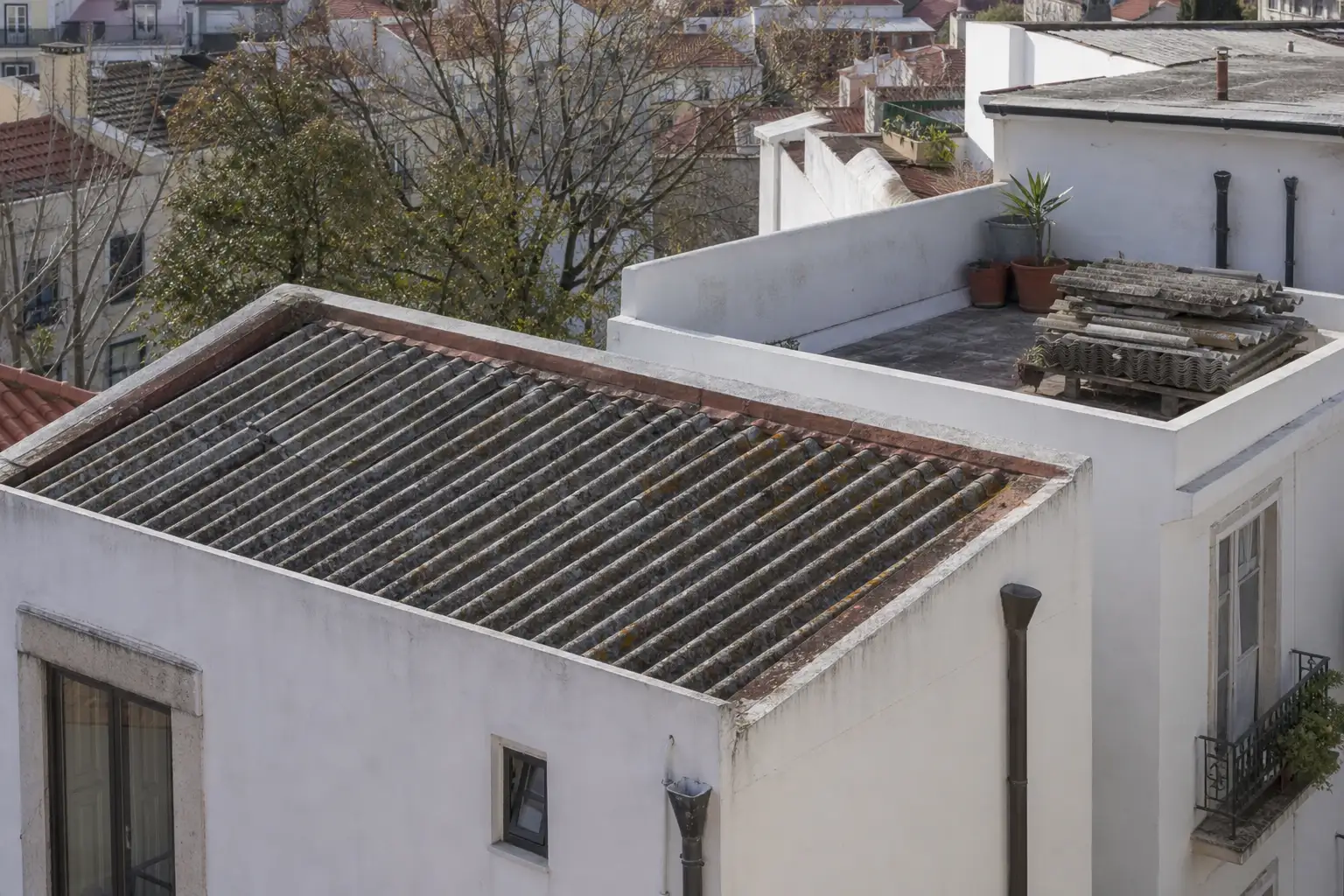 Detail of an older roof on a Portuguese house, viewed from a safe distance before renovation work.
