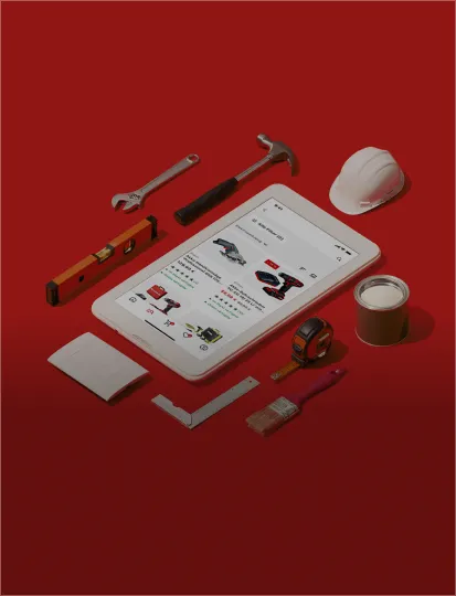 A tablet surrounded by various DIY tools on a red background, highlighting Toom Baumarkt app.