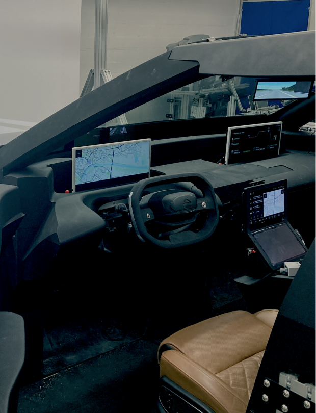 Prototype of an in-car digital dashboard with navigation, media, and connectivity features under development.