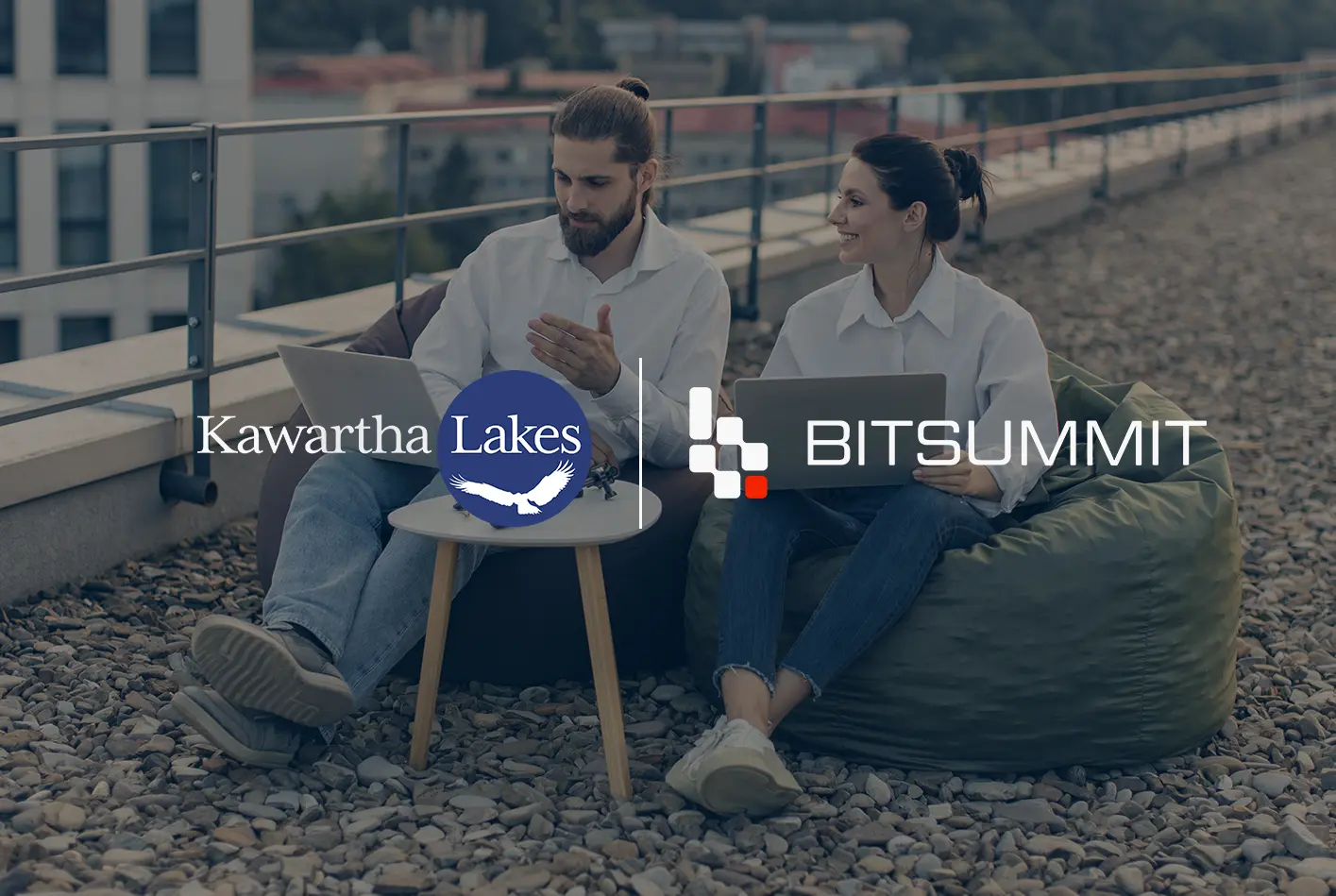 City of Kawartha Lakes and BITSUMMIT logos over two colleagues working on laptops on a rooftop, Microsoft Purview success story