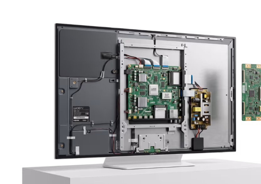 Back view of a Lucid TV with its internal circuit boards and wiring exposed.