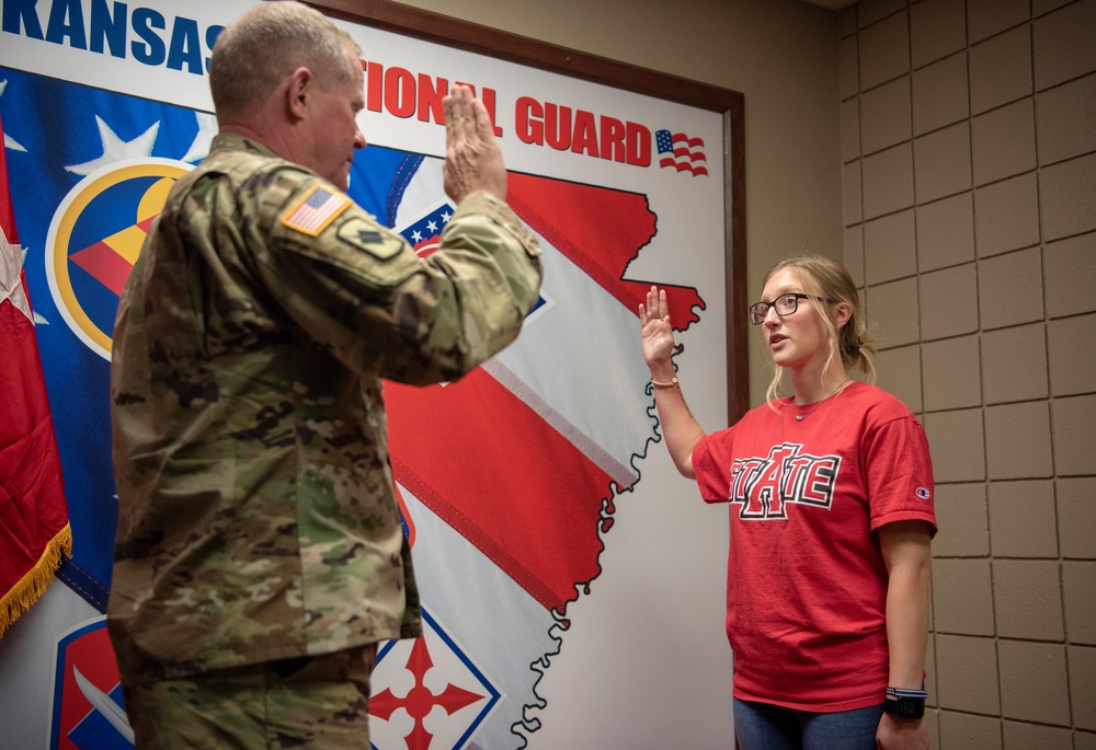 An Arkansas National Guard enlistee takes the oath of enlistment