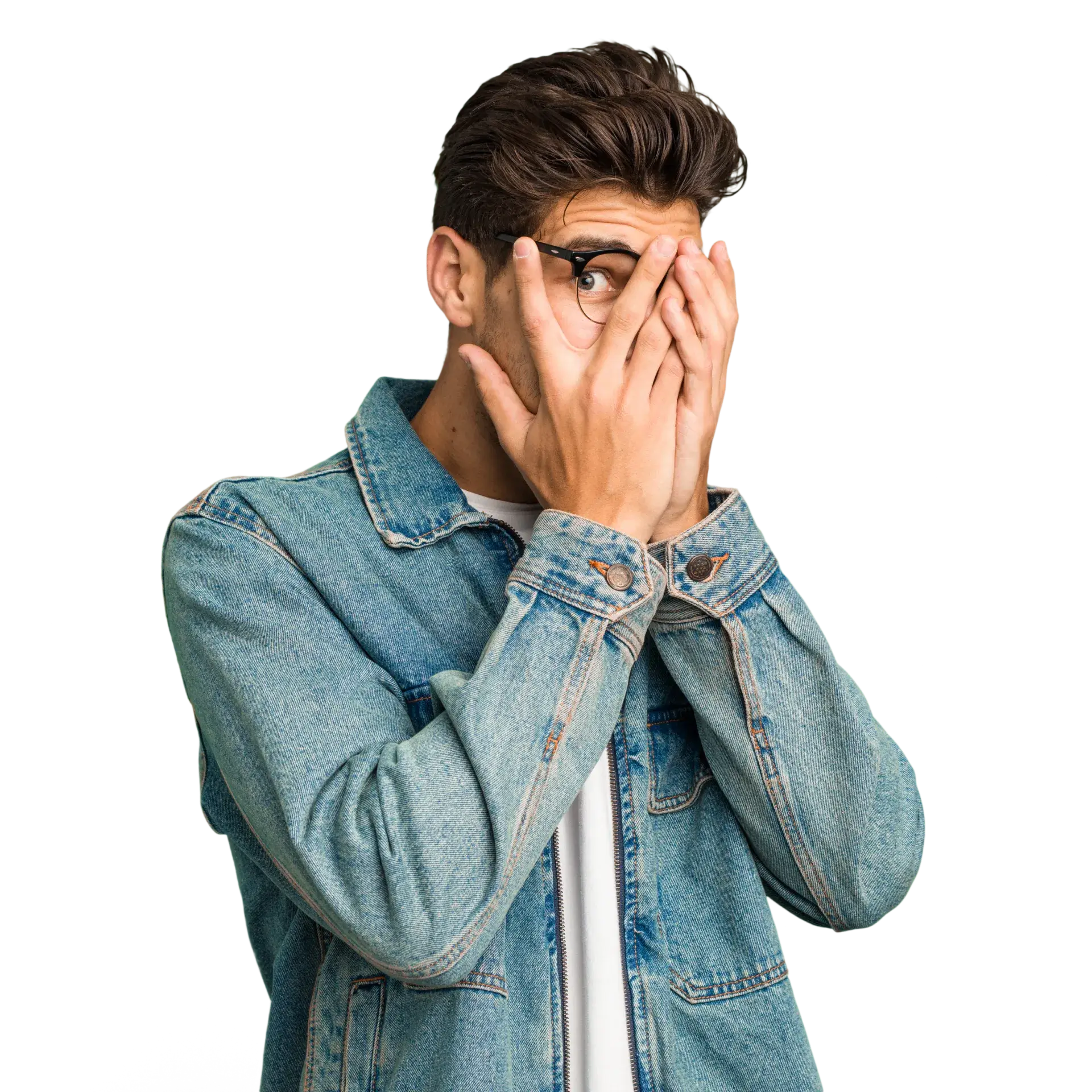 A man covering his face with his hands.