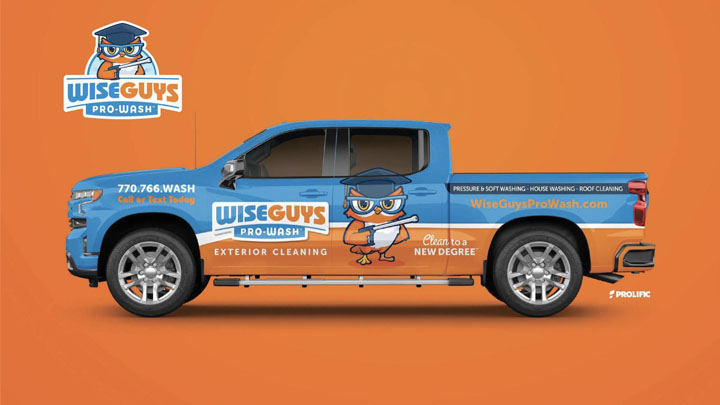 Wiseguys Pro-Wash owl mascot applied to a blue and orange pickup