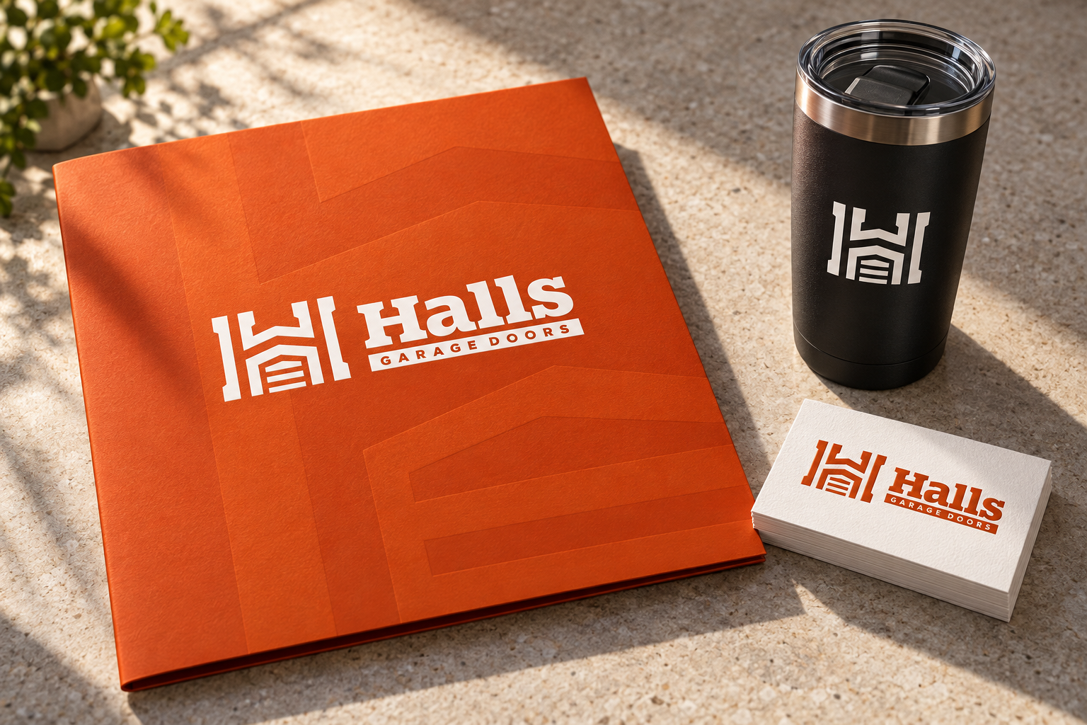 AI-generated brand concept for Halls Garage Doors: premium service collateral.