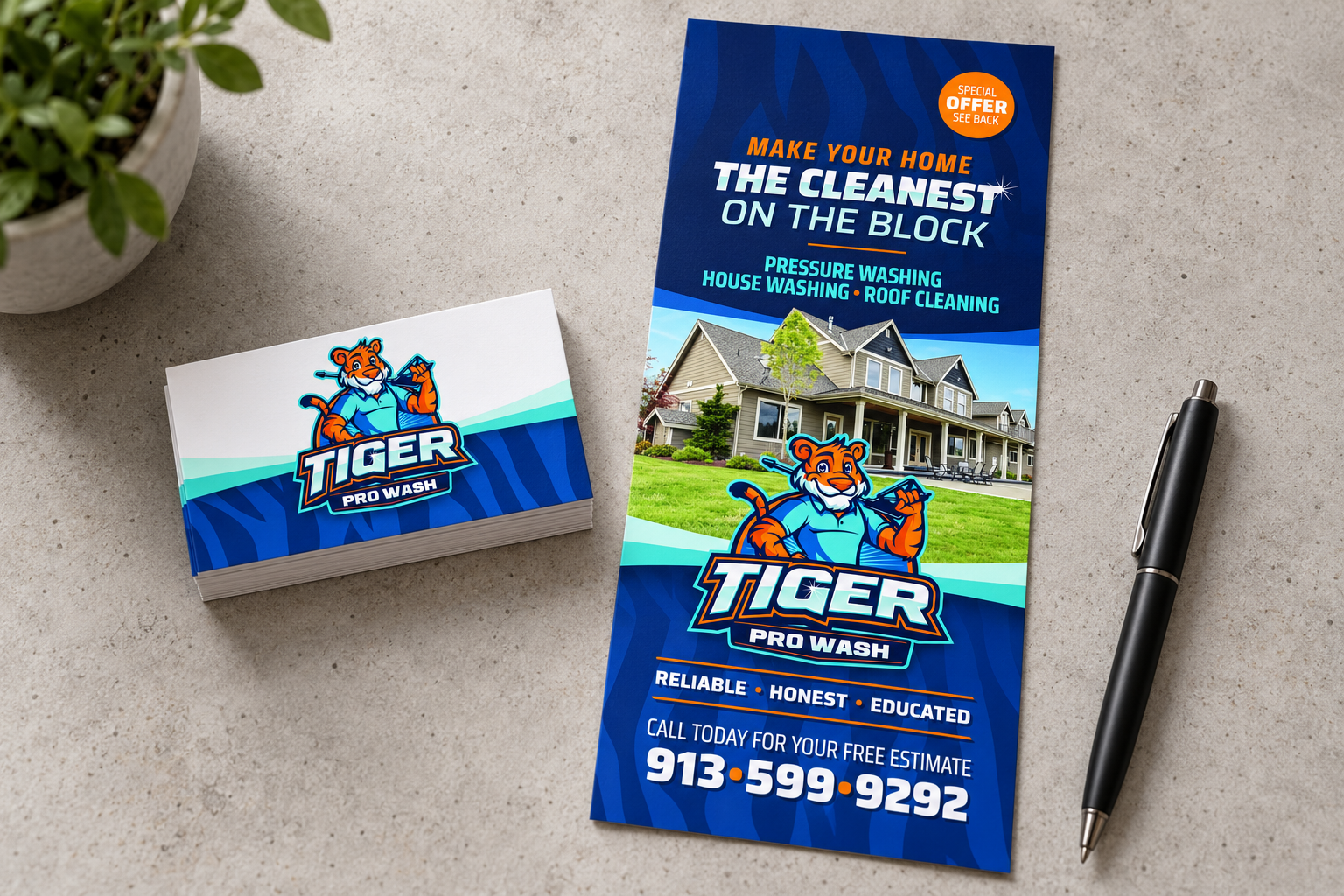Illustrative presentation of Tiger Pro Wash original business-card and door-hanger artwork.