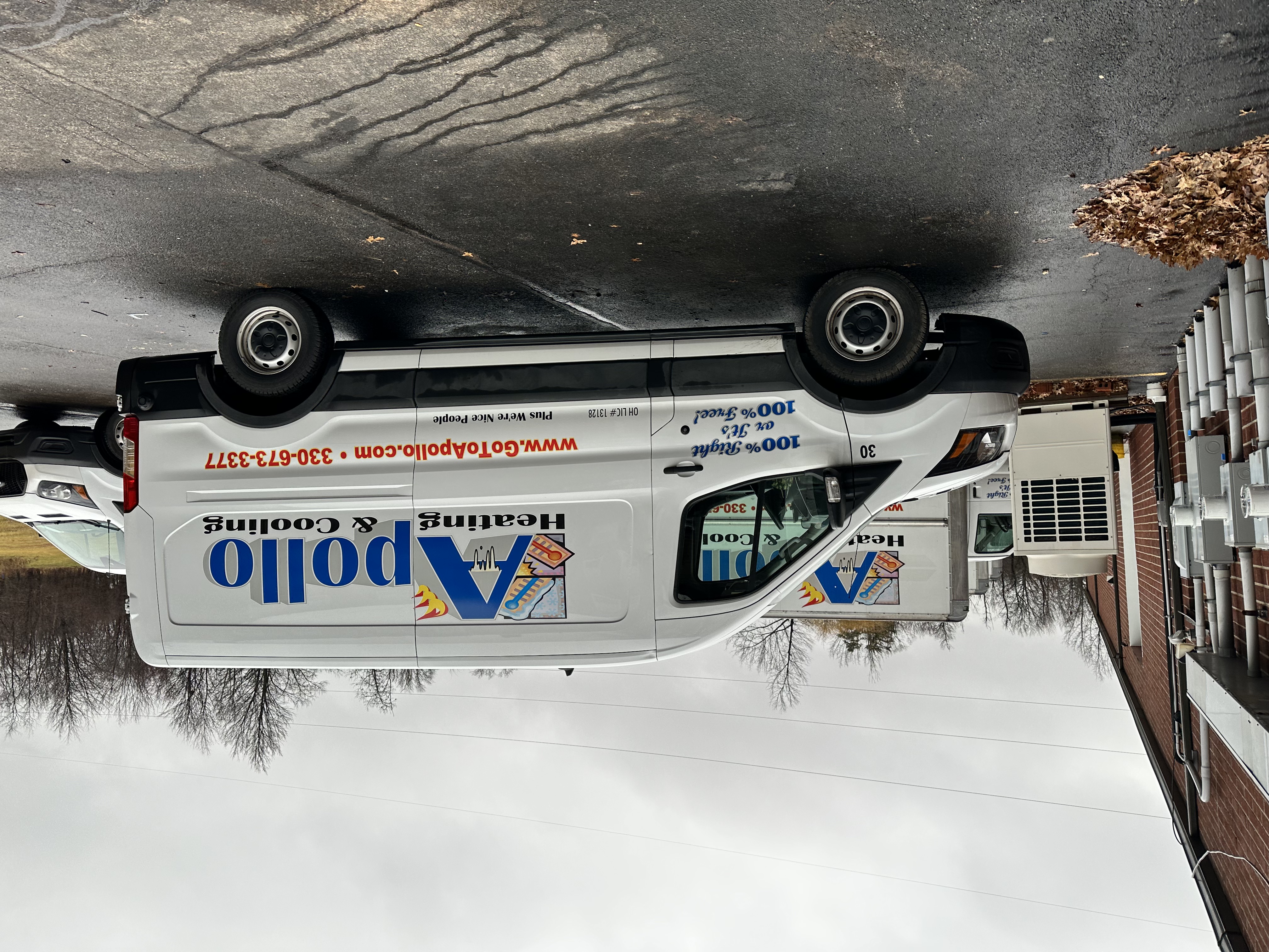 Before: Apollo Heating Cooling Plumbing vehicle photograph showing the previous branding.