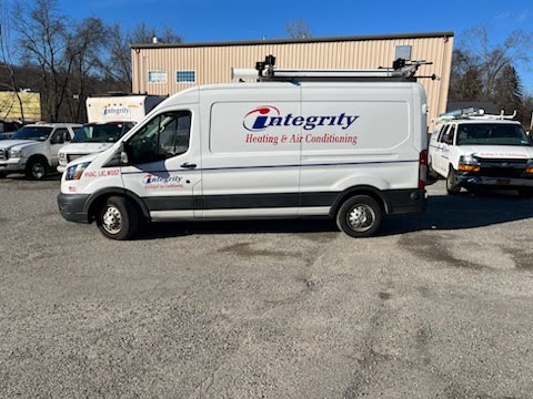Before: Beluga Heating & Air vehicle photograph showing the previous branding.