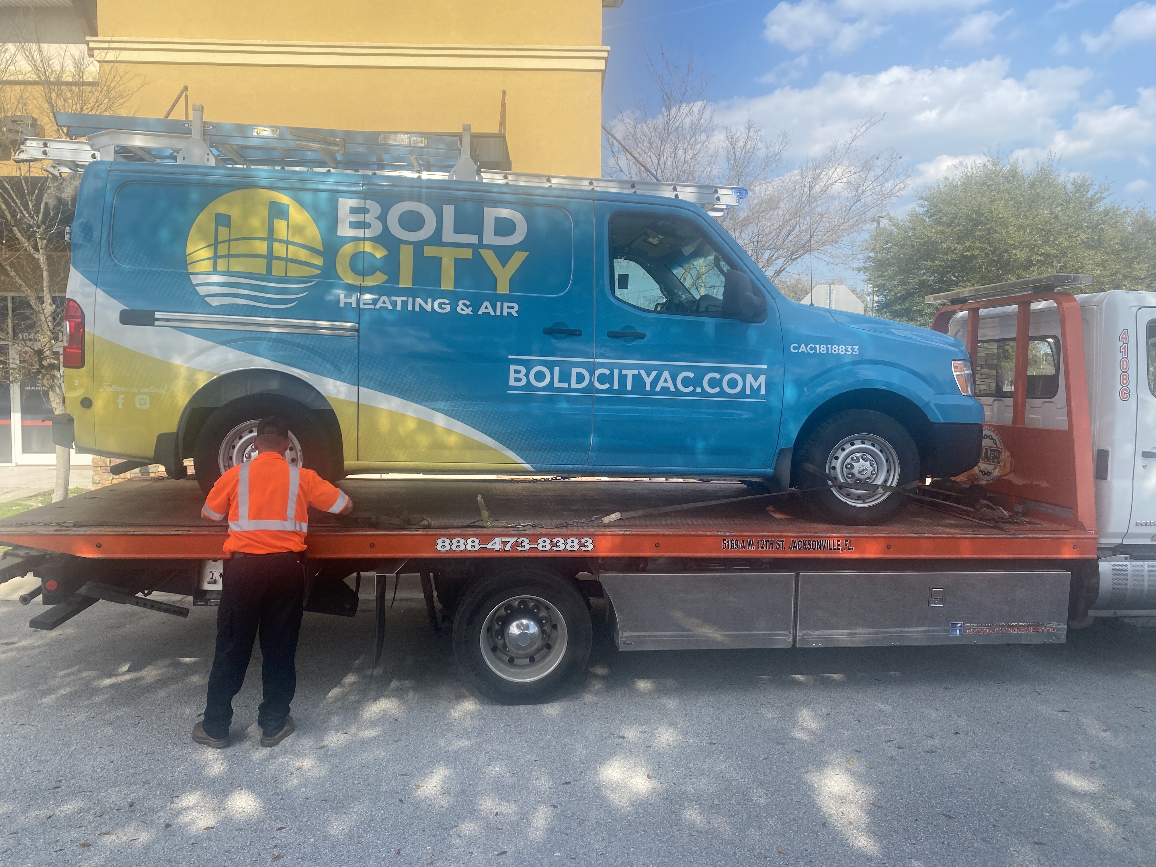Before: BoldCity Heating & Air vehicle photograph showing the previous branding.
