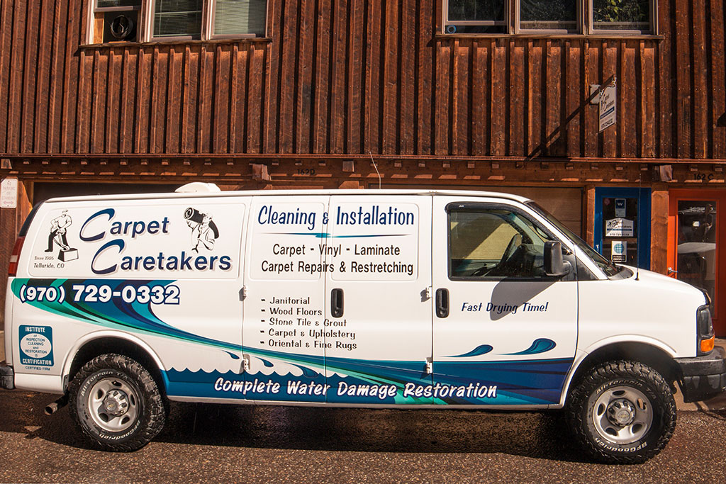 Before: Carpet Caretakers vehicle photograph showing the previous branding.