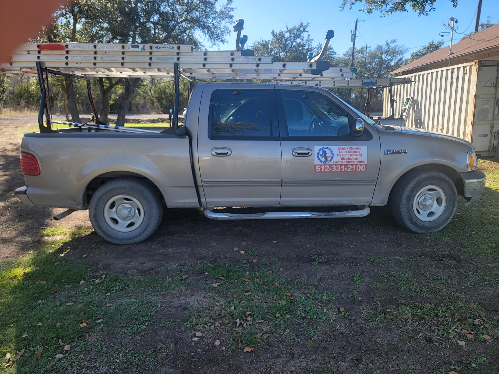 Before: original Central Texas Window Cleaning vehicle photograph.