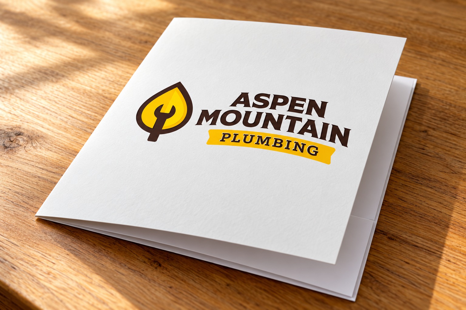 Aspen Mountain Plumbing presentation folder mockup.