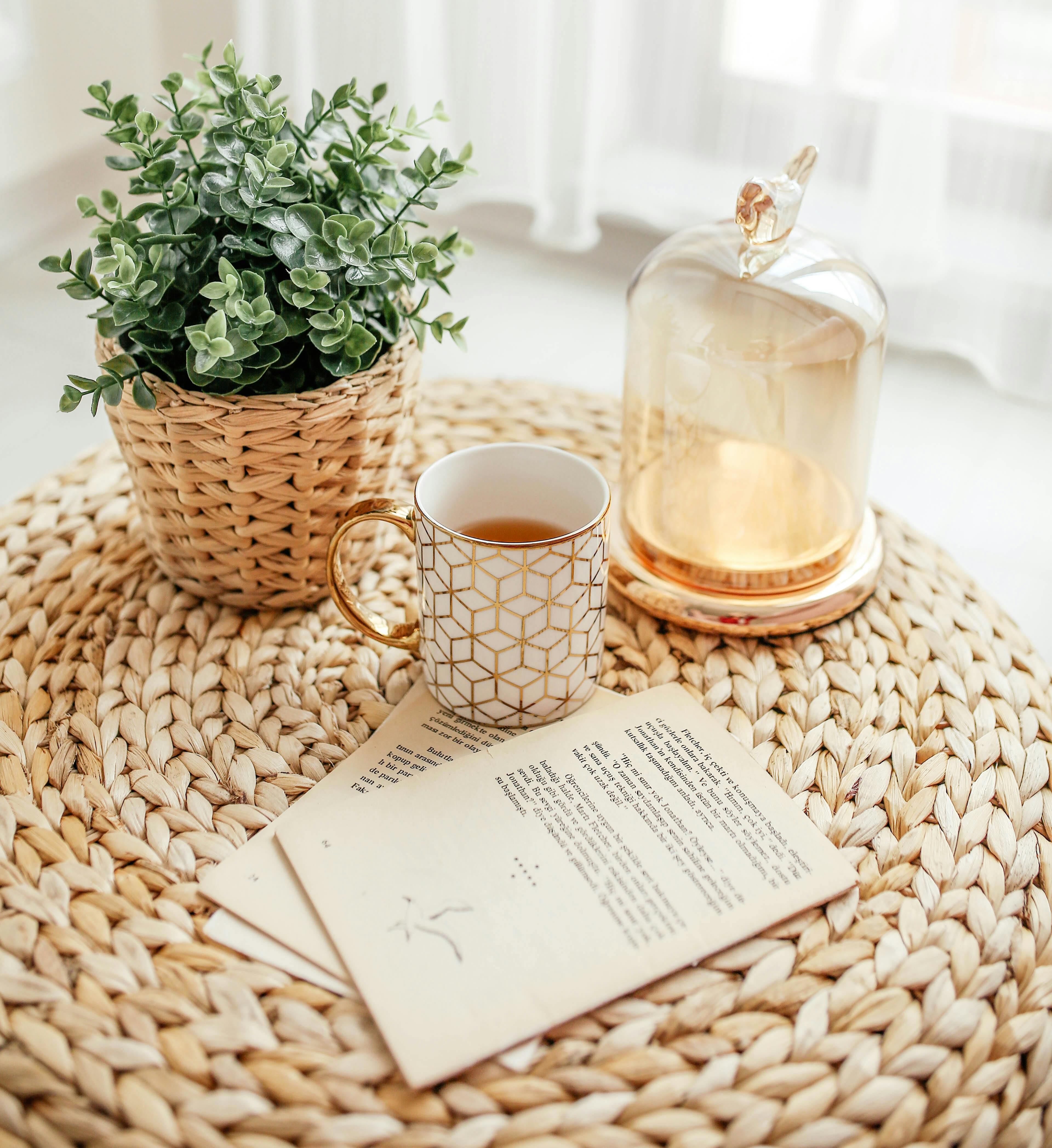Quiet morning ritual with tea and journal, symbolizing rest as a form of responsibility and self-care.