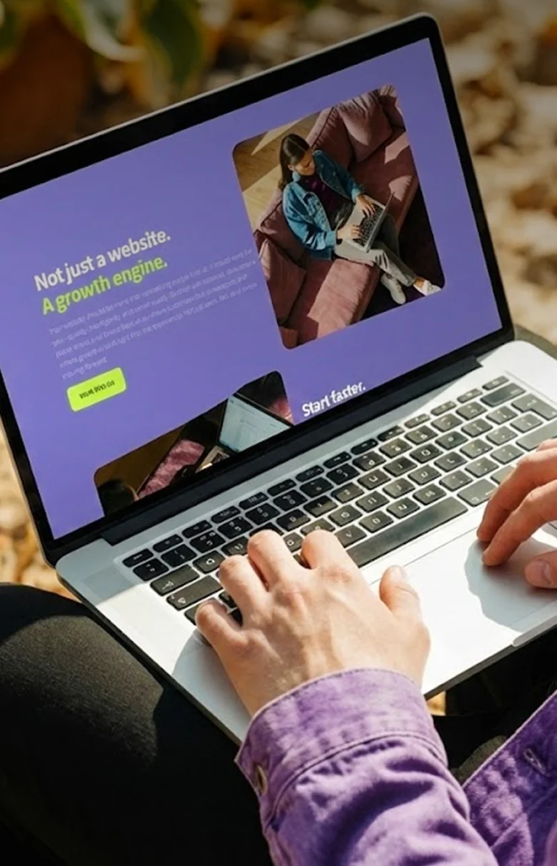 Modern UI/UX website layout design for B2B startups displayed on a laptop screen, featuring a purple brand palette and minimalist aesthetic.