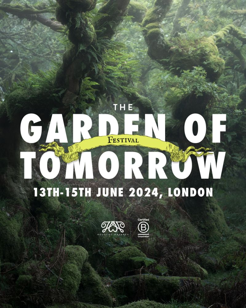 Garden of Tomorrow Festival logo on a background of trees. 